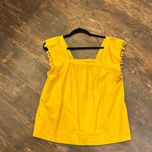Mustard yellow J. Crew top. Cute Pom details. Size 12